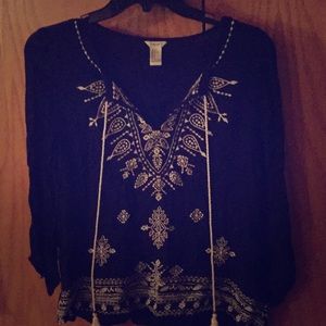 Super cute black blouse with white details